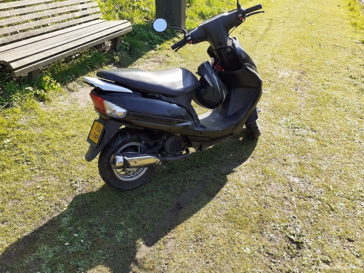 Scooter met kap schade...